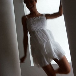A beautiful ballerina is dancing.